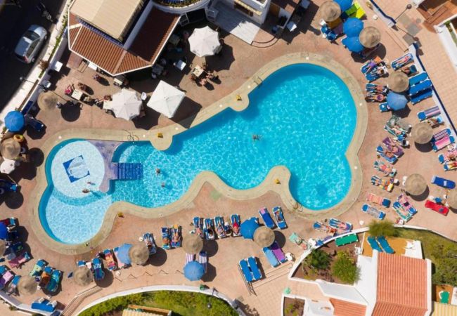 Apartahotel en Playa de Las Americas - Disfruta la Calidez de este Estudio con Terraza y Piscina Apartahotel en Playa de Las Americas - Disfruta la Calidez de este Estudio con Terraza y Piscina